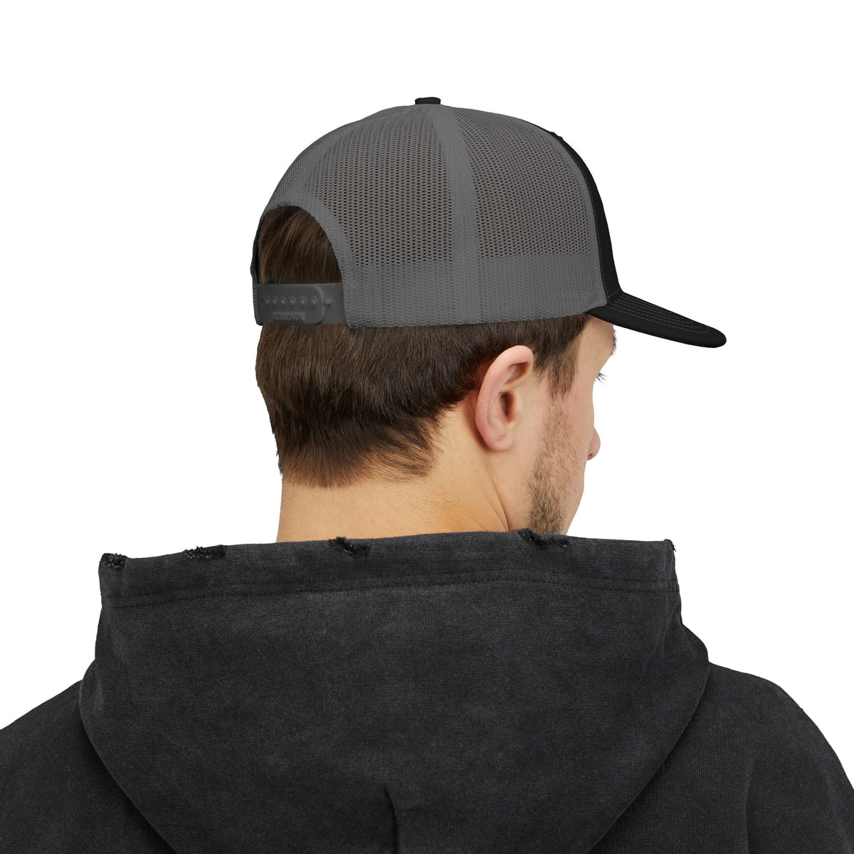 Model wearing the River House Albacore Tuna trucker hat, side and gray mesh back view