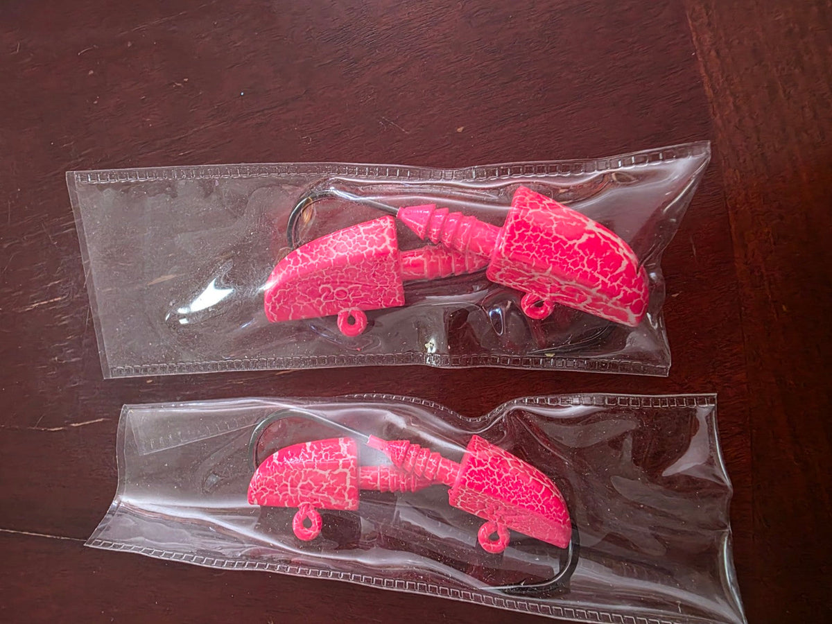Pink crackle lead jig heads packaged in two-piece packs
